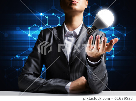 Concept of lightbulb as symbol of new idea. Concept of lightbulb as symbol of new idea. 61689583