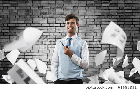 Conceptual image of young businessman. Conceptual image of young businessman. 61689881