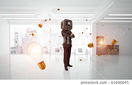 Businessman with an old TV instead of head. 61690045