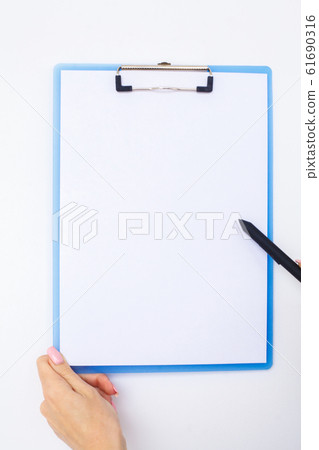 Blank Folder with White Paper. Hand that Holding Folder and Handle on White Background. Copyspace. Place for Text 61690316