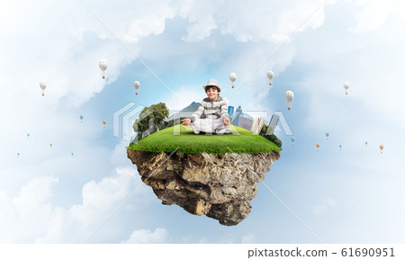 Little boy keeping mind conscious. 61690951