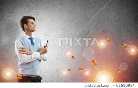 Conceptual image of young businessman. Conceptual image of young businessman. 61690954