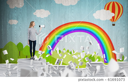 Woman keeping megaphone in hand. Woman keeping megaphone in hand. 61691073