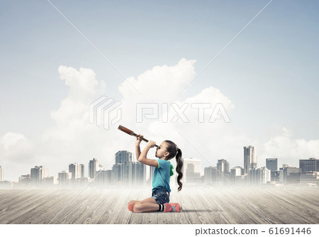 Concept of careless happy childhood with girl dreaming about fut Concept of careless happy childhood with girl dreaming about fut 61691446