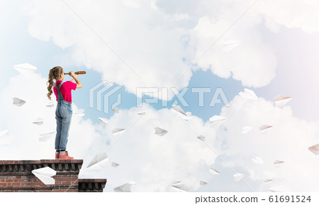 Concept of careless happy childhood with girl exploring this world Concept of careless happy childhood with girl exploring this world 61691524