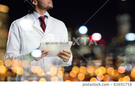 Medical industry concept by means of successful doctor Medical industry concept by means of successful doctor 61691758