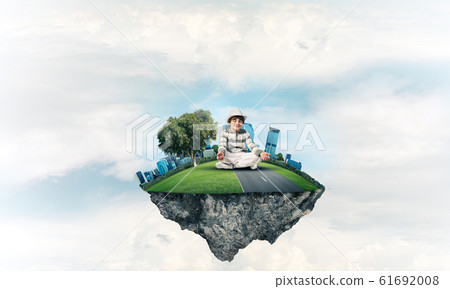 Little boy keeping mind conscious. 61692008