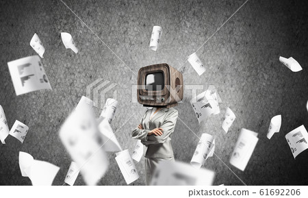 Business woman with old TV instead of head. Business woman with old TV instead of head. 61692206