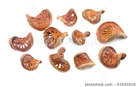 dried quince slices an isolated on white dried quince slices an isolated on white 61693850