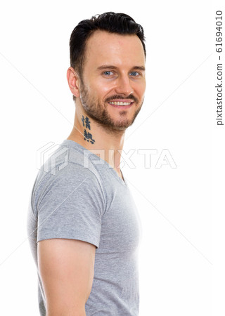 Portrait Of Handsome Man Against White Background 61694010