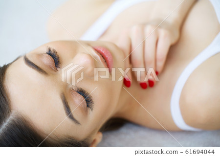 Beauty eyes makeup closeup. Long eyelashes, perfect skin Beauty eyes makeup closeup. Long eyelashes, perfect skin 61694044