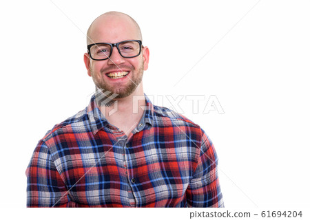 Studio shot of young bald muscular man Studio shot of young bald muscular man 61694204