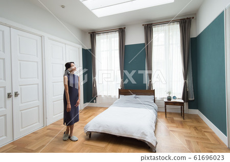 Modern interior bedroom woman 61696023