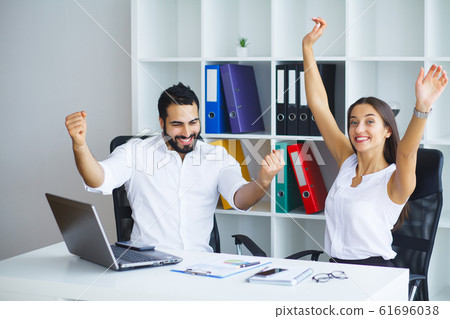 Group of young executives having a work meeting Group of young executives having a work meeting 61696038