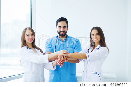 Group of medical workers portrait in hospital Group of medical workers portrait in hospital 61696321