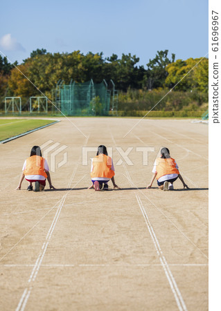 Running high school student Running high school student 61696967