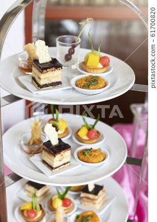 Mixed and assorted fruits tart with kiwi and grape Mixed and assorted fruits tart with kiwi and grape 61700820