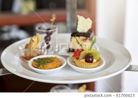 Mixed and assorted fruits tart with kiwi and grape Mixed and assorted fruits tart with kiwi and grape 61700823