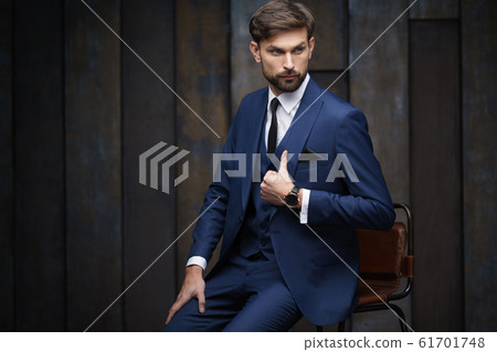 indoor photo of young handsome stylish businessman wearing suit 61701748