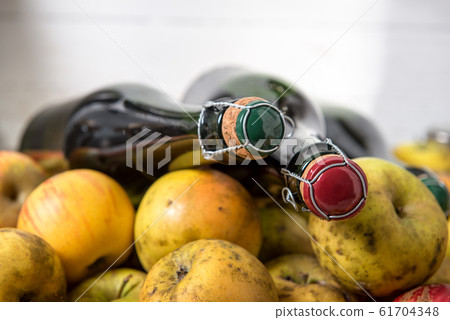 bottles of cider and apples of normandy bottles of cider and apples of normandy 61704348