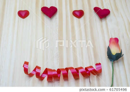 four red hearts with a pink background for 61705496