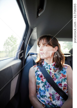 happy woman traveling in a car happy woman traveling in a car 61706093