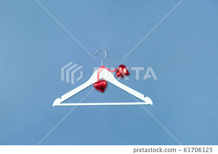 One hanger with two heart pendants flat lay for 14 One hanger with two heart pendants flat lay for 14 61706125