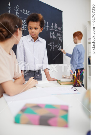 Teacher checking knowledge of students 61707350