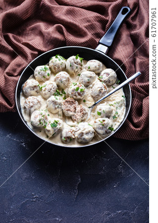 classic Swedish meatballs in a pan with spoon classic Swedish meatballs in a pan with spoon 61707961