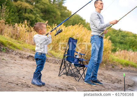A happy family spends time together they teach A happy family spends time together they teach 61708168