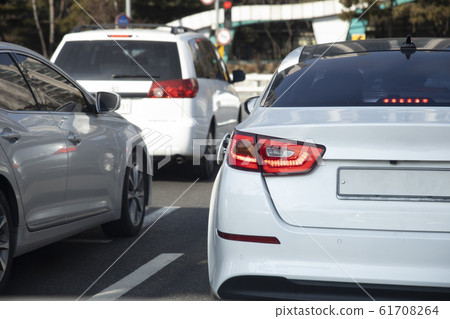 A vehicle driven with its fuel tank cap open 61708264