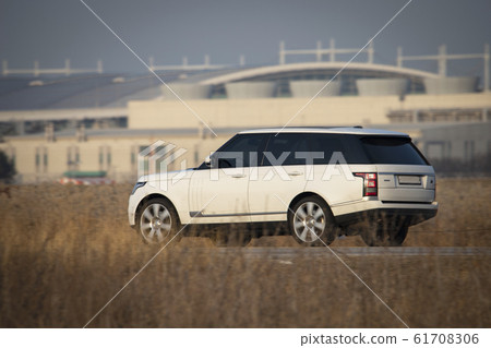 SUV vehicle running on the road SUV vehicle running on the road 61708306