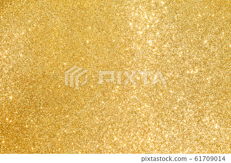 sparkles of golden glitter abstract background sparkles of golden glitter abstract background 61709014