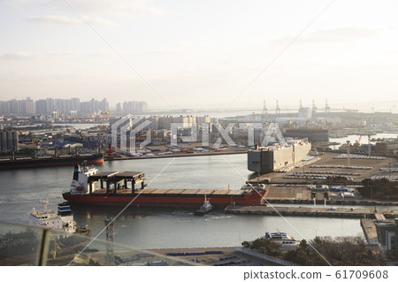 Cargo ship passing through Incheon Port Dock 61709608