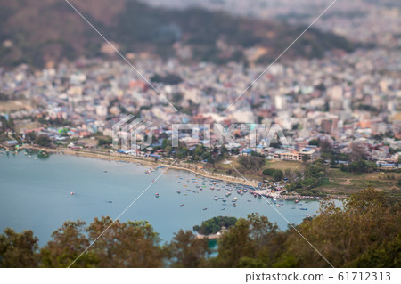 Panoramic view of pier on the lake Pheva. 61712313