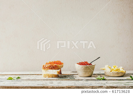 Red caviar with bread and butter 61713628