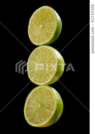 Green fresh organic kiwi halves on black background 61714108