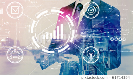 Marketing concept with businessman holding a tablet Marketing concept with businessman holding a tablet 61714394