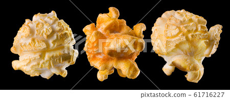 Set of popped popcorn on a black background Set of popped popcorn on a black background 61716227