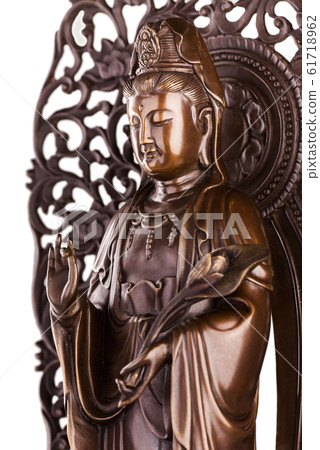 Bodhisattva sculpture Guan Yin with flower. 61718962