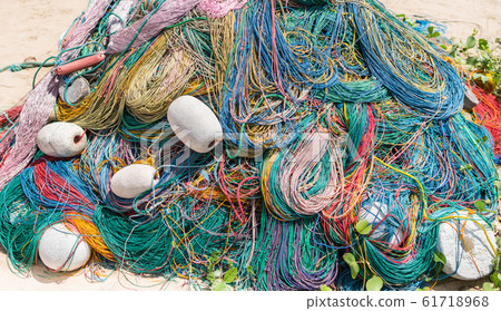 Color Fishing net, floats, nylon rope on the bank Color Fishing net, floats, nylon rope on the bank 61718968