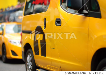 Yellow cab cars in traffic on Times Square Yellow cab cars in traffic on Times Square 61719442
