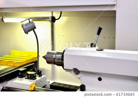 Fragment of a Automatic CNC lathe Machine. Fragment of a Automatic CNC lathe Machine. 61719885