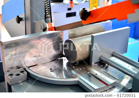 Industrial CNC lathe with band saw for cutting metal products. Industrial CNC lathe with band saw for cutting metal products. 61720031