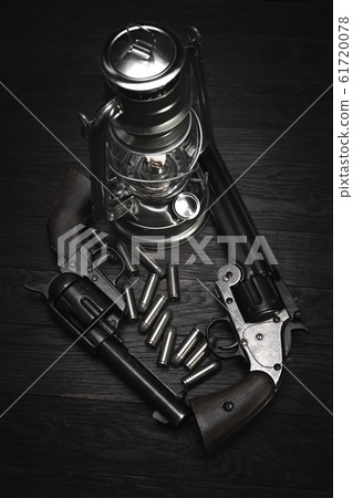 Old western cold blast lantern and revolver gun 61720078