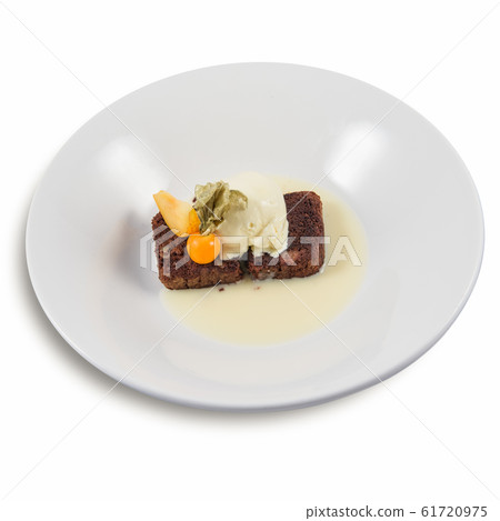 Chocolate Walnut Brownies with vanilla icecream and physalis 61720975