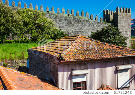 Antique houses next to the Fernandine Walls in Porto city 61721248
