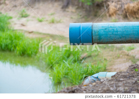 PVC drainage pipes in irrigation canal, sewage and 61721378