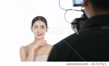 Beauty concept. A beautiful woman modeling in a 61727321