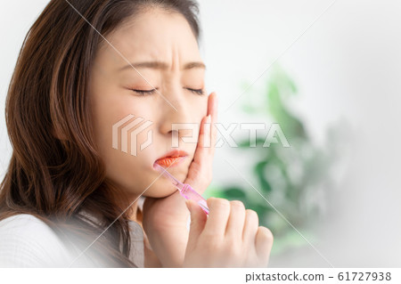 A decayed woman 61727938